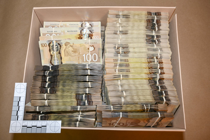 Bundles of $100 Canadian bills seized